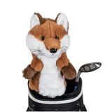 A fox-shaped golf club head cover sitting in a golf bag, with a club peeking out.