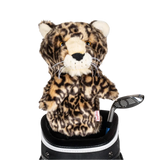 A leopard-shaped golf club head cover sitting in a golf bag, with a club peeking out.