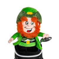 A Leprechaun-shaped golf club head cover sitting in a golf bag, with a club peeking out.