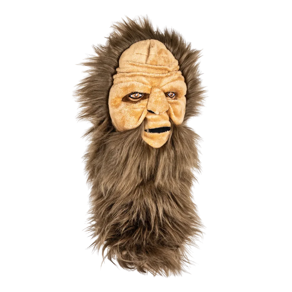 Plush golf head cover resembling a Sasquatch with a facial expression, featuring brown fur and a sculpted face.