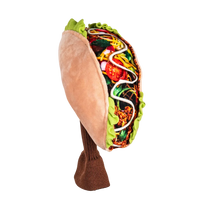 A plush golf head cover resembling a taco, featuring a colorful filling, including vegetables and sauce.