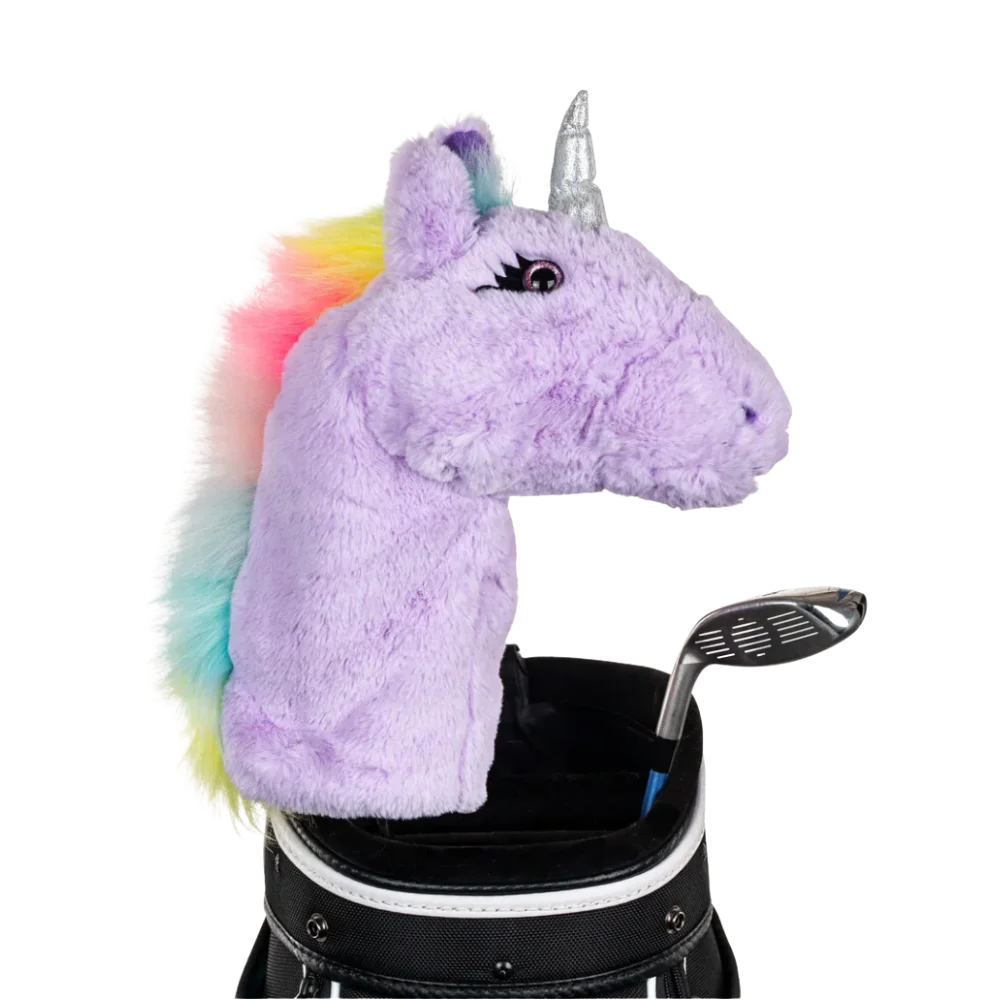 A unicorn-shaped golf club head cover sitting in a golf bag, with a club peeking out.