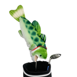 A fish-shaped golf club head cover sitting in a golf bag, with a club peeking out.