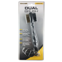 Champ Dual Brush in its packaging with a retractable clip.