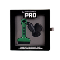 Green shamrock PrideSports PRO Precision Brush in retail packaging with retractable clip and carabiner.