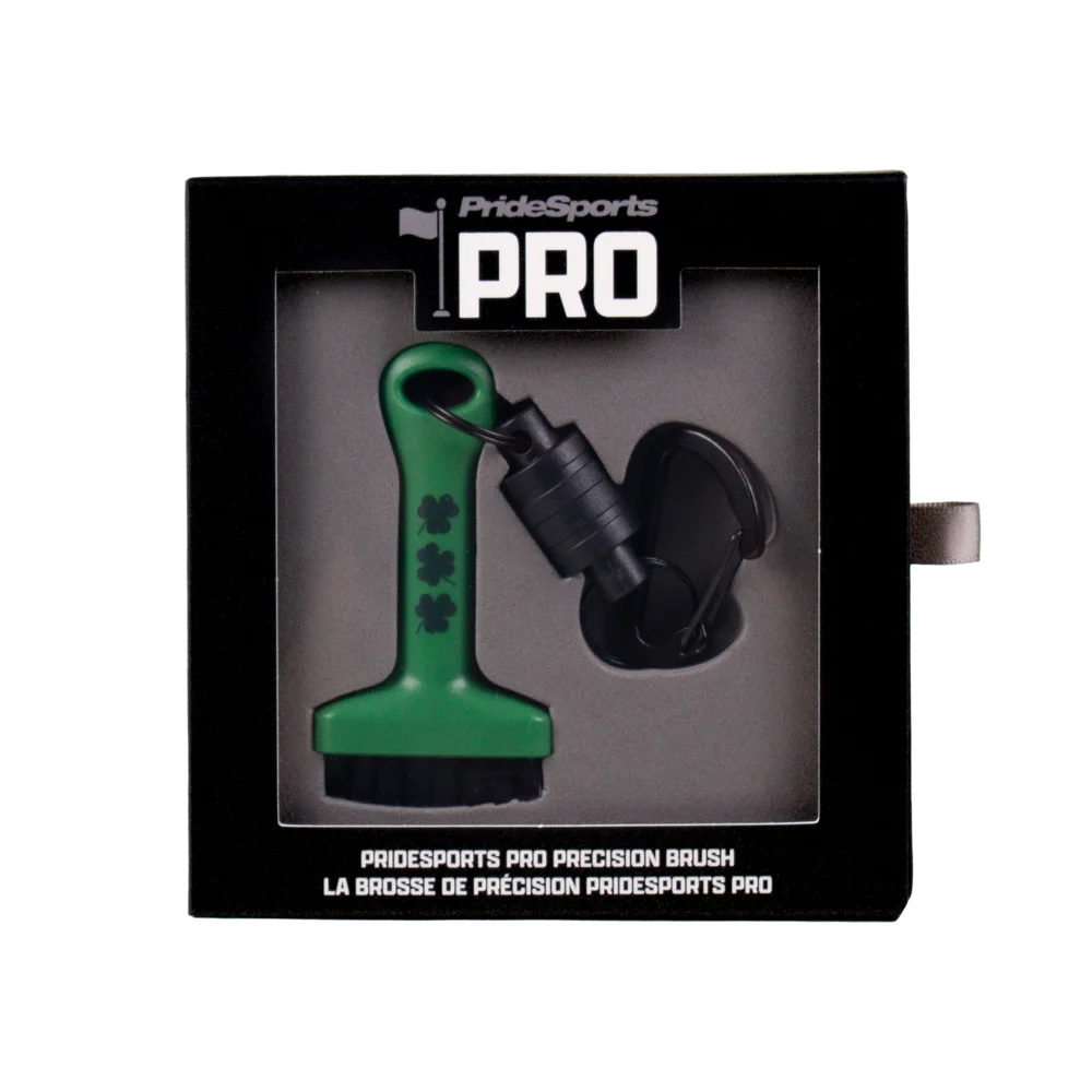 Green shamrock PrideSports PRO Precision Brush in retail packaging with retractable clip and carabiner.