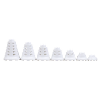 Seven white simulator golf tee sizes lined up from tallest to shortest.