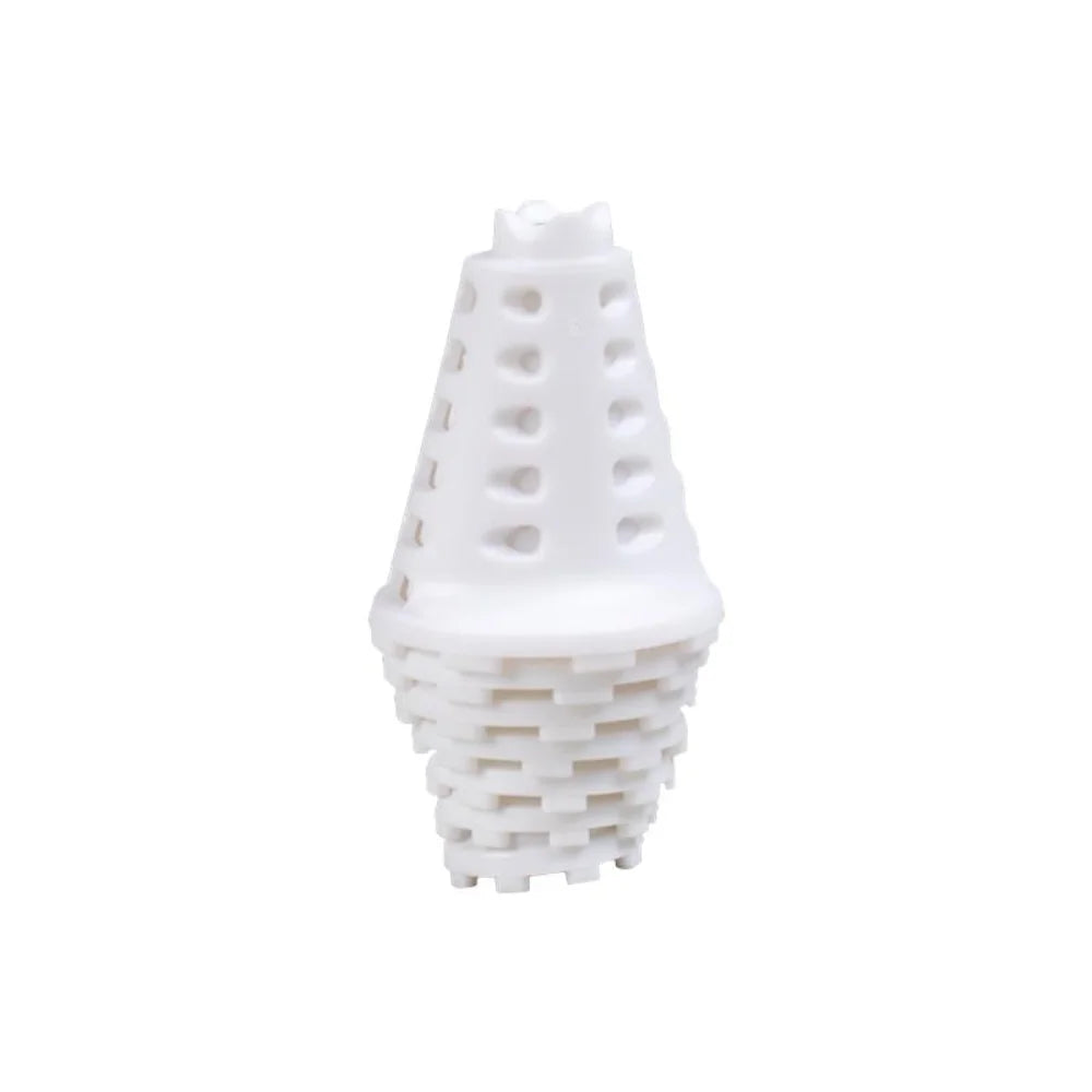 Close-up of stacked white simulator golf tees showing telescoping ring design.