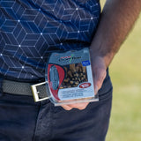 A person holding a pack of Pride Golf Tees, featuring 30 brown wooden tees with a 3½-inch length. The packaging highlights enhanced design and stability for performance in golf.