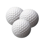 Three white practice golf balls on a white background