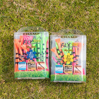 Two packages of golf tees on grass, labeled "champ fly tee," one containing 30 colorful tees with black stripes of 3¼ inches and the other 25 colorful tees with black stripes of 2½ inches, highlighting durability and preferred usage.